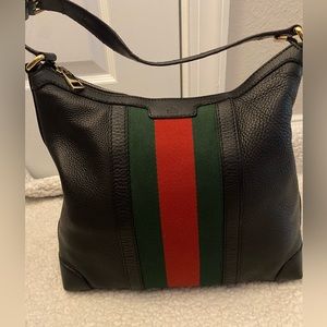 Original stripped, black soft leather Gucci bag